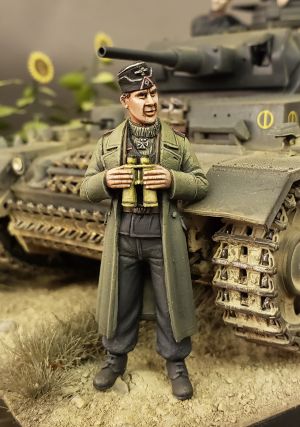 S2KW096 - German tank officer in greatcoat